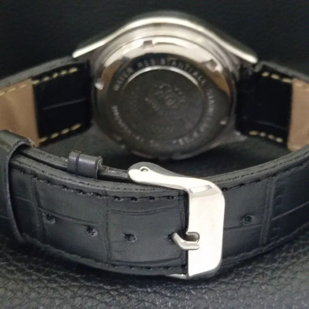 Vintage 1977 Oval Orient Automatic Mens Silver Watch W/daydate & White accents